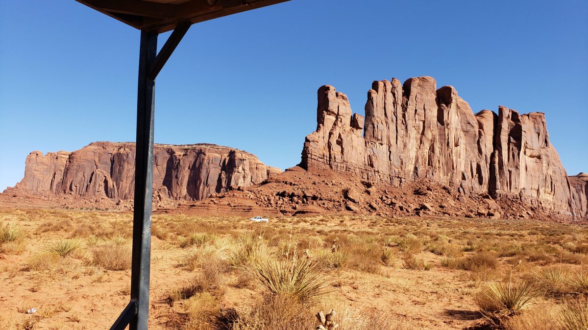 a building with a mountain in the background